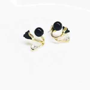 black and golden earrings