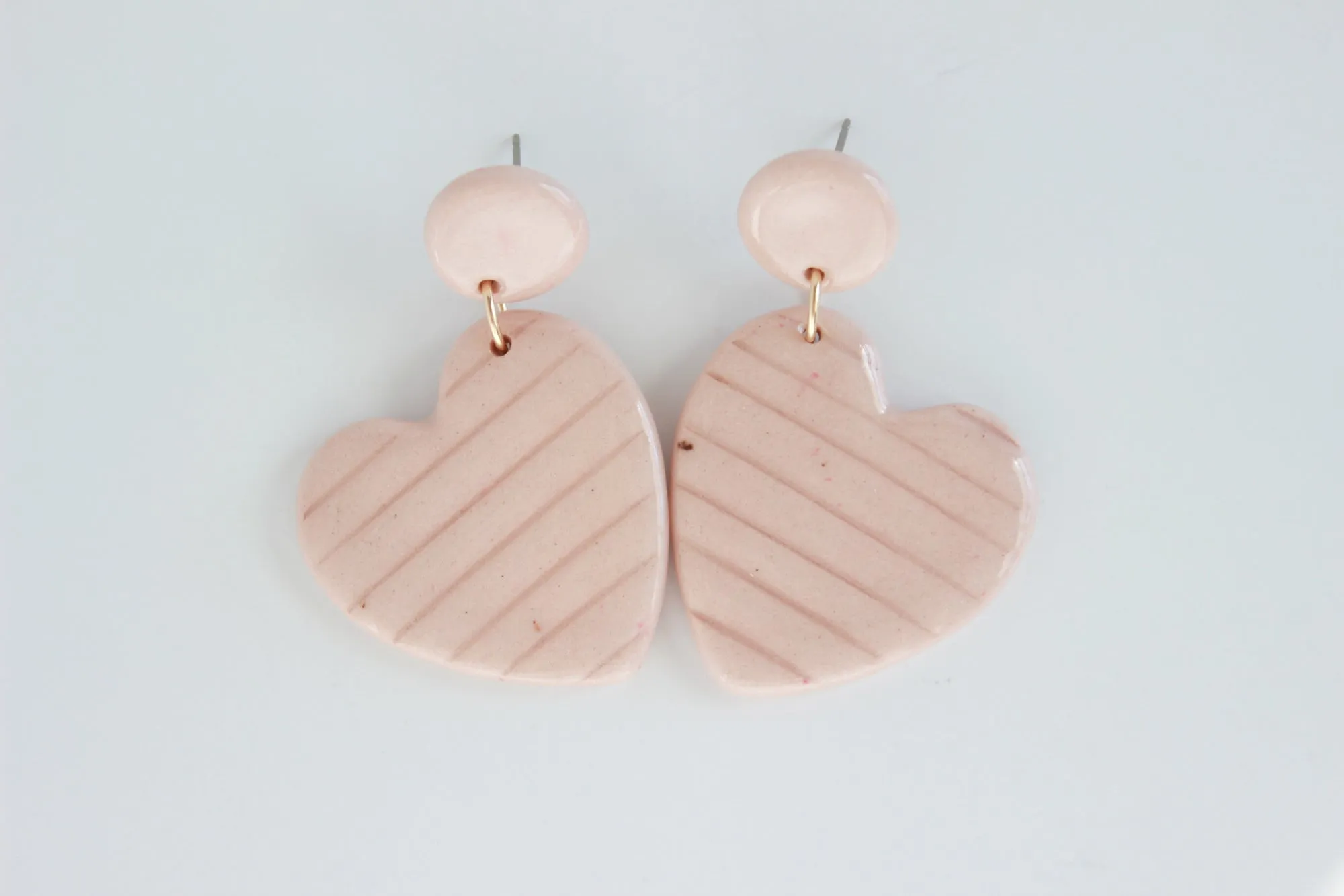 Pink Sideways Heart Statement Earrings